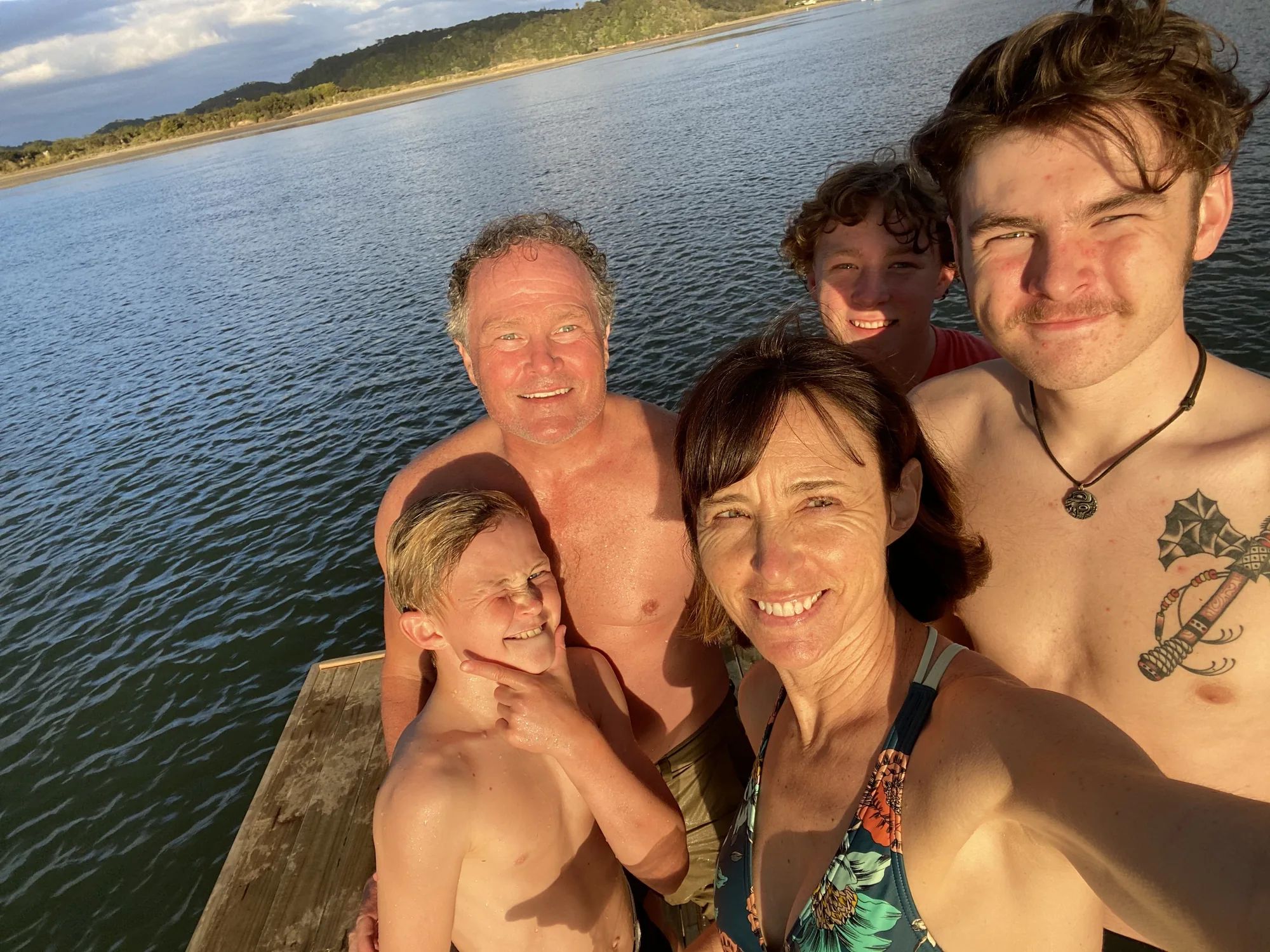 Family taking a selfie on the Ngaruru swim raft