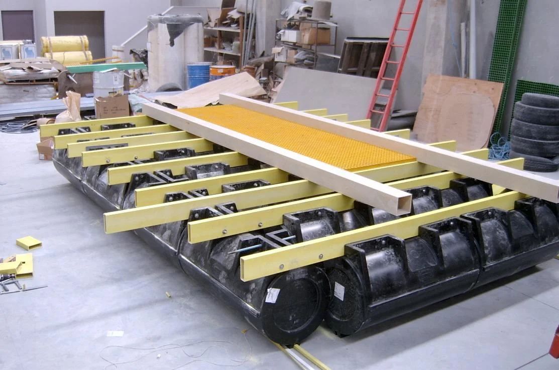Work barge frame on Main Boat Pods being fitted out in a workshop