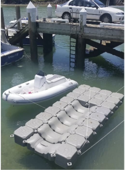 Jet ski on a small Float Pod dock beside a wharf
