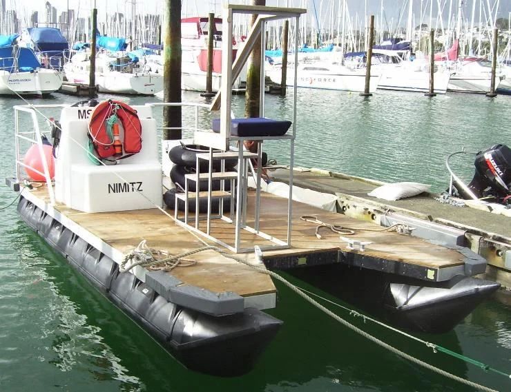 Pile-servicing barge at Westhaven Marina